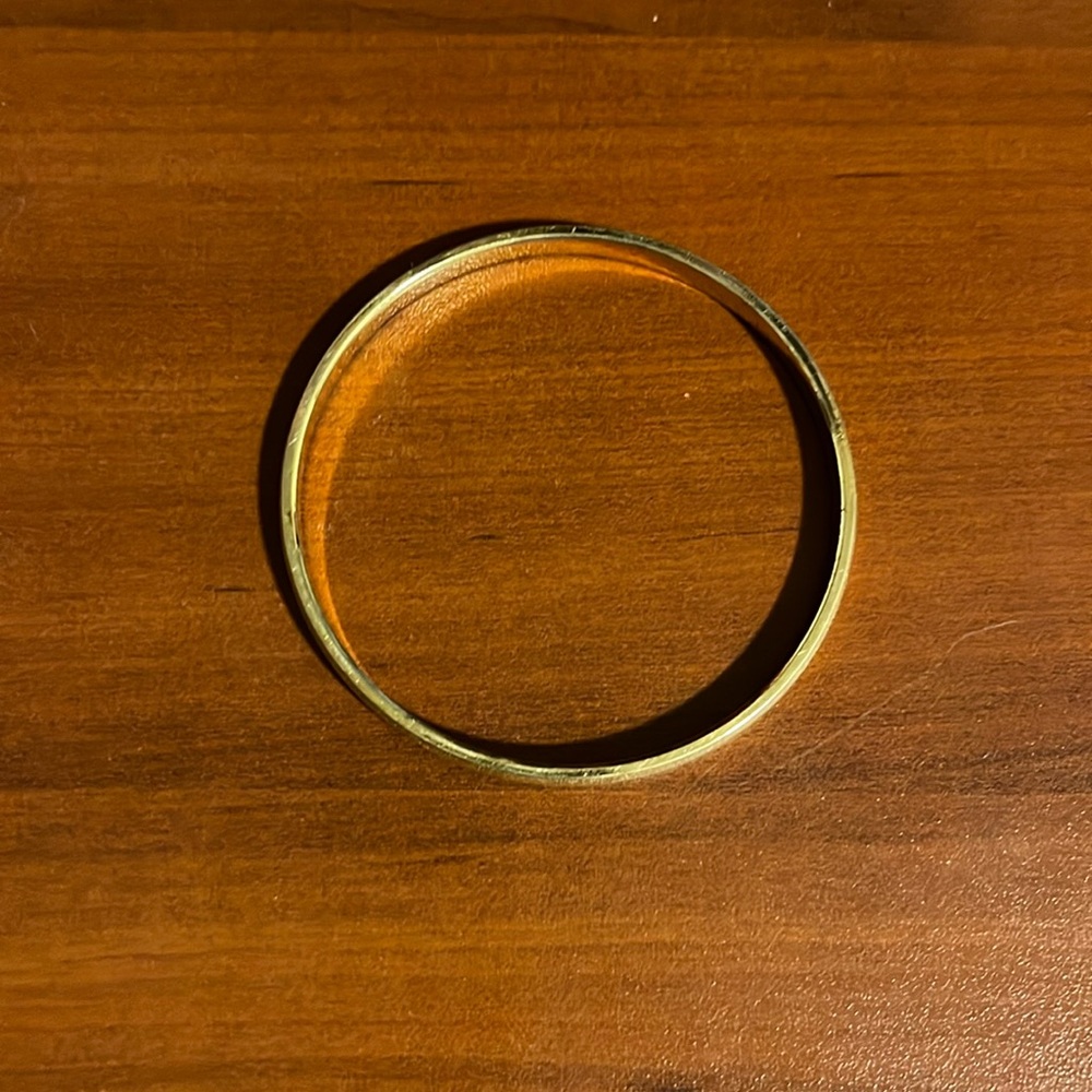 Monet gold tone textured bangle.